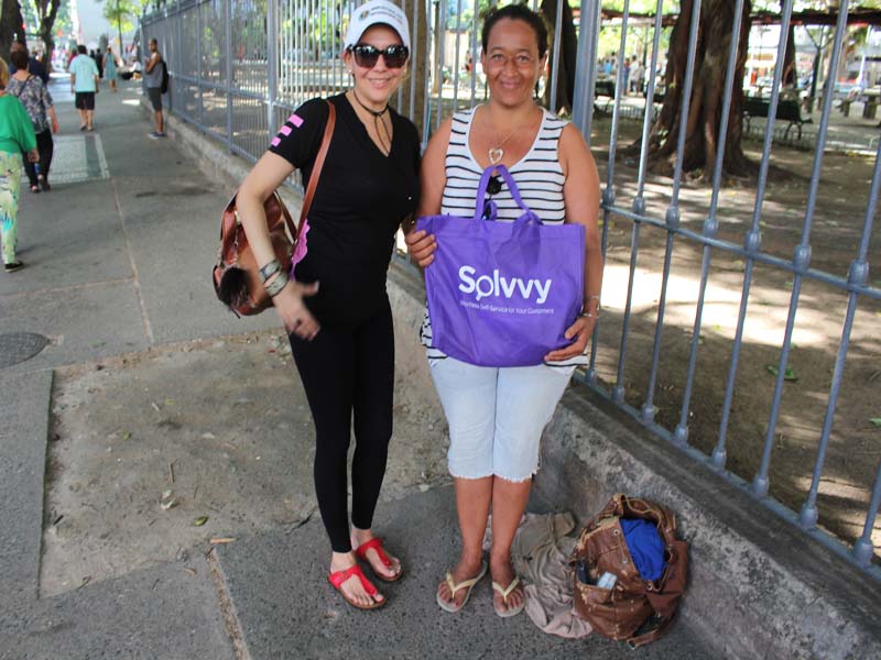 Liliana Presenting to an Homeless Woman 