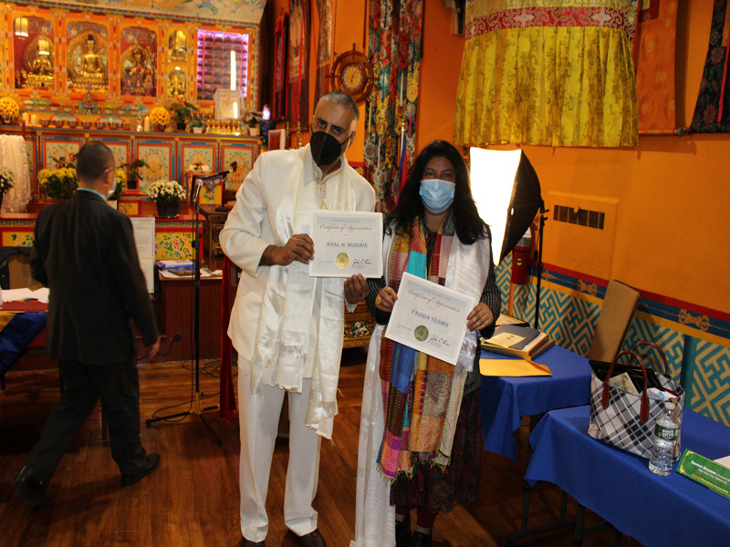 Dr.Abbey with Farida Yesmin Holding up award by State Senator John Lui 