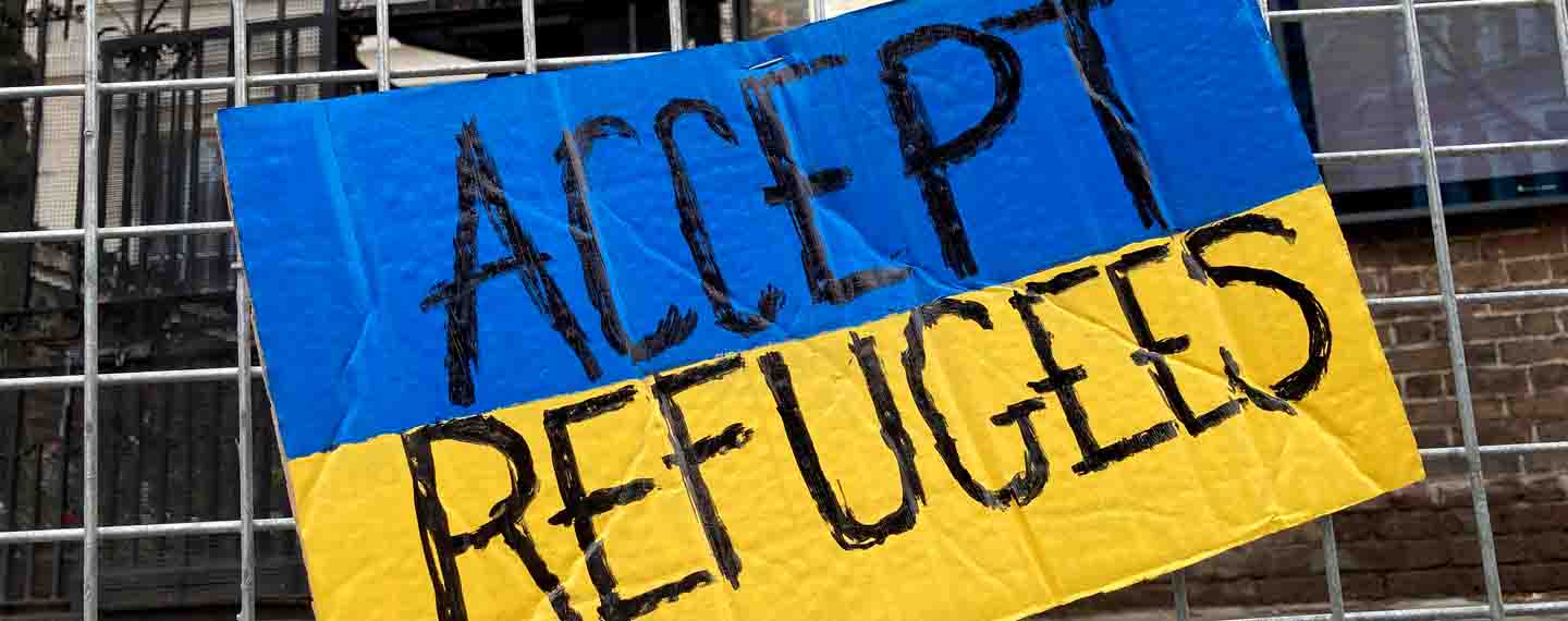 The Banner says it all Accept Refugees 